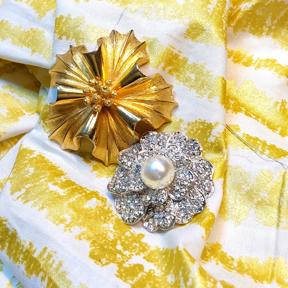 Brooches gold and silver for any occasion.Gold one is signed coro.
